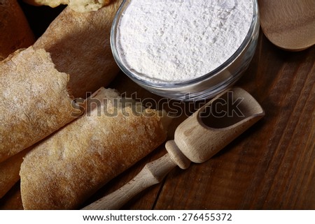 White bread flour and appliances for cooking closeup, horizontal picture