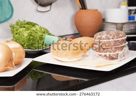 Ingredients for Hamburger before cooking / Cooking Hamburger concept