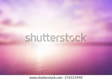 Calm concept: Abstract blur beautiful purple and pink ocean with sky sunset background