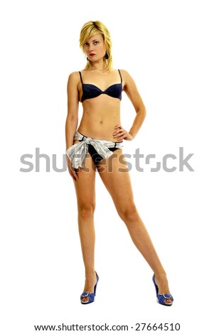 Full body view of lovely fashion model in bikini standing in fashion pose, isolated on white.