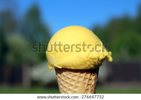 Mango ice cream with cone 