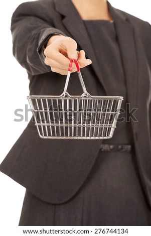 Attractive businesswoman with shopping cart.
