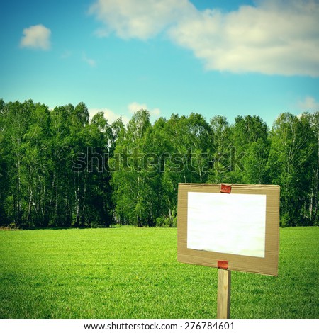 Toned Photo of Signboard in the Summer Meadow