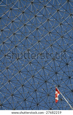 The Biosphere in Montreal detail abstact photo, small canadian flag