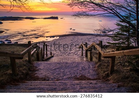 Lake Superior Sunset. Stairs leading to a beautiful Lake Superior sunset beach at the Hurricane River Campground in Pictured Rocks National Lakeshore.
