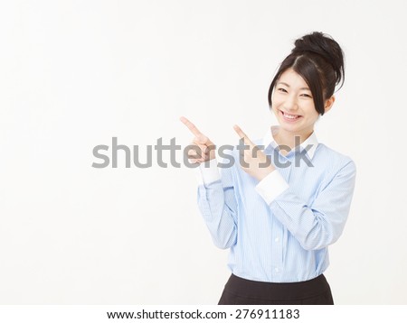 Japanese businesswoman pointing side