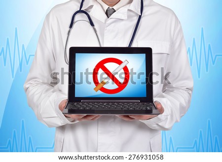 doctor holding notebook with no smoking symbol on screen