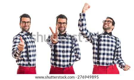 Set images of posh boy doing victory gesture 