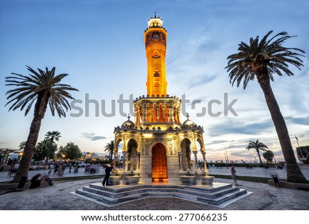 Clock Tower Izmir. Konak Square street view with old clock tower. It was built in 1901 and accepted as the official symbol of Izmir City, Turkey Royalty-Free Stock Photo #277066235