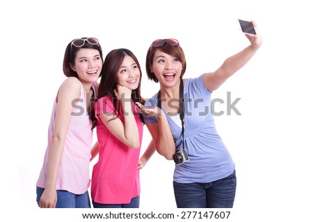 Selfie - Happy teenagers woman taking pictures by themselves isolated on white background, asian