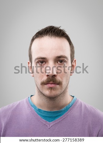 front view of caucasian man with blank expression. real people portrait Royalty-Free Stock Photo #277158389