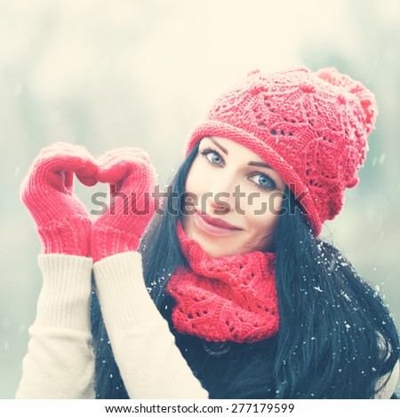 Christmas Girl. Happy Woman with Snow. Winter and Love