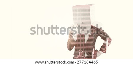 Anonymous businessman touching his chin against new york skyline