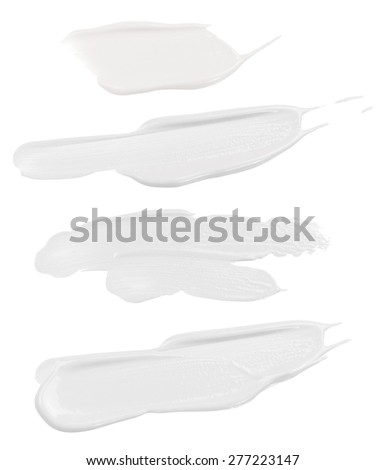 White Face Cream Swatches Isolated on white Royalty-Free Stock Photo #277223147