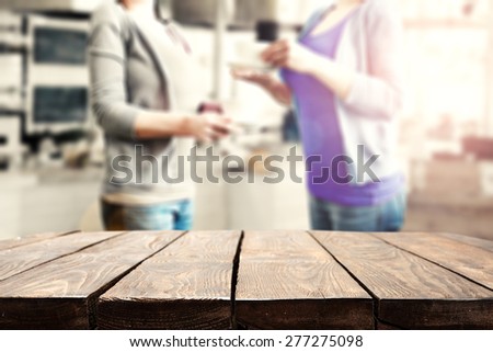 brown old table of wood and interior of kitchen 