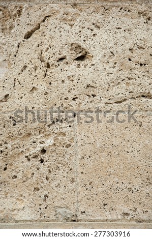 Stone wall close up background photo texture.