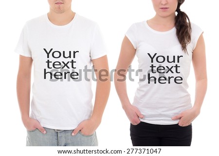 man and woman showing t-shirts with "your text here" isolated on white background Royalty-Free Stock Photo #277371047
