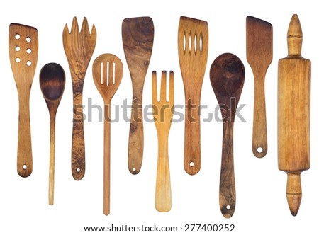 Wooden spoons, spatulas and a rolling pin isolated on white background Royalty-Free Stock Photo #277400252