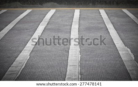 Traffic lines on concrete road