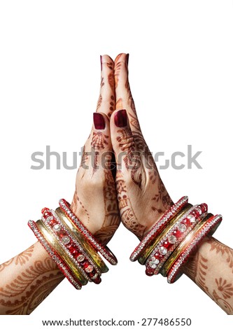 Woman hands with henna in Namaste mudra on white background 