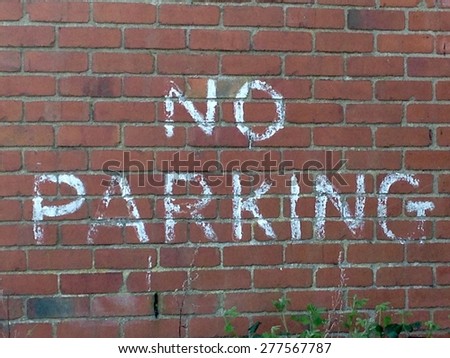 No Parking Writing on the Wall