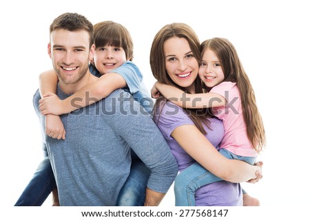 Young family with two kids  Royalty-Free Stock Photo #277568147