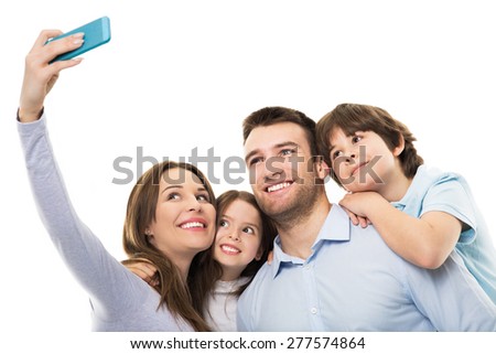 Family taking photo of themselves  