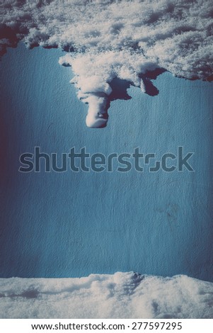 Colour picture of snow covering a wall