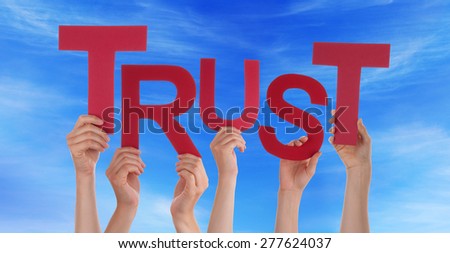Many Caucasian People And Hands Holding Red Letters Or Characters Building The English Word Trust On Blue Sky