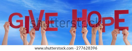 Many Caucasian People And Hands Holding Red Letters Or Characters Building The English Word Give Hope On Blue Sky