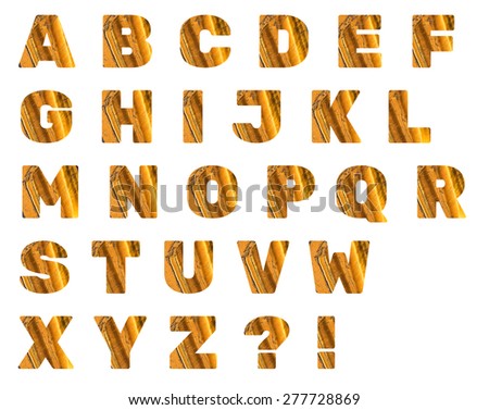 Alphabet from mineral tiger eye  isolated on white background.