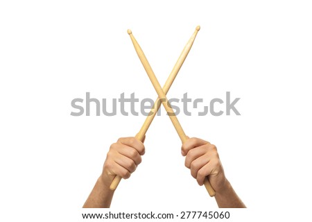 Male hands holding drum sticks Royalty-Free Stock Photo #277745060