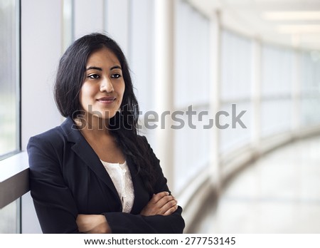 Successful business woman looking confident in the office 