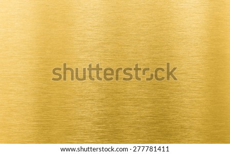 gold brushed metal texture or background Royalty-Free Stock Photo #277781411
