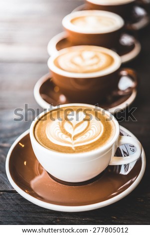 Soft focus on latte coffee cup - vintage effect process pictures