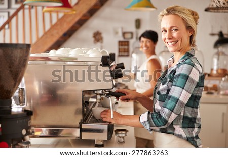 Cafe staff at work Royalty-Free Stock Photo #277863263