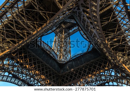 Fragment of construction the Eiffel Tower (La Tour Eiffel). Paris, France. Eiffel Tower, named after engineer Gustave Eiffel, is tallest structure in Paris and most visited monument in world.