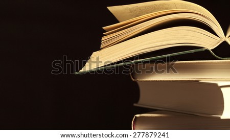 books lie on each other. with copy-space