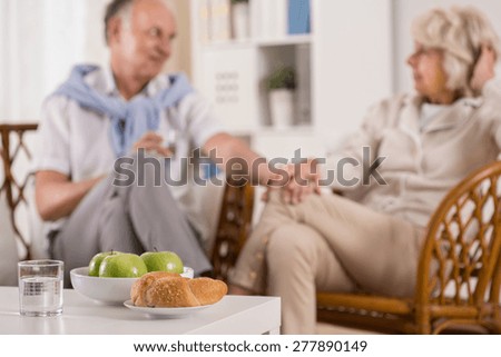 Picture presenting daily life of senior couple