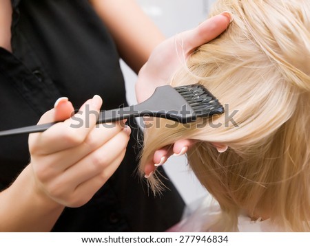 hair coloring in the salon. process Royalty-Free Stock Photo #277946834
