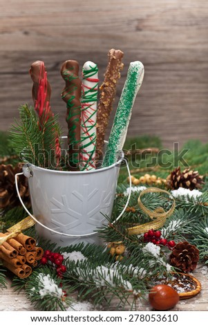 Christmas Decoration with Holiday Chocolate Covered Pretzels. Selective focus.