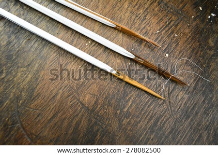 Wooden sticks and  brown background
