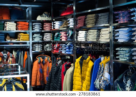 Fashionable apparel store with men shirts   Royalty-Free Stock Photo #278183861