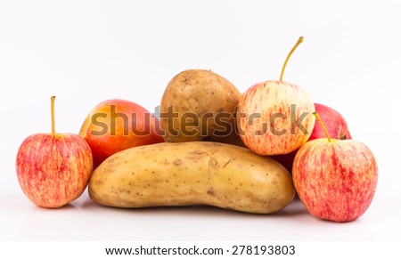 apple and potato on white background Royalty-Free Stock Photo #278193803