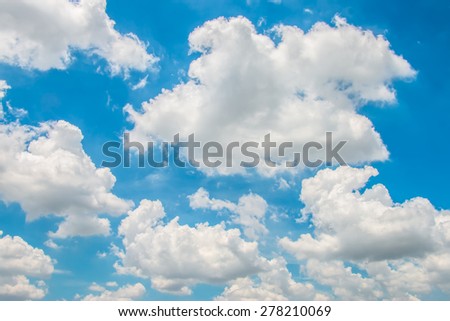 Fluffy Clouds and blue sky background