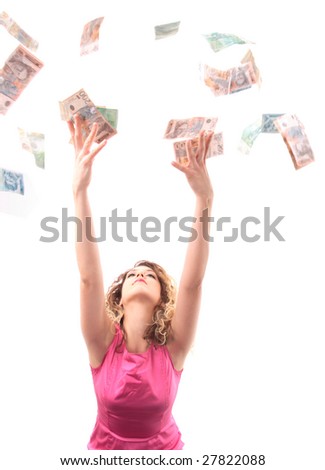 Nice girl catching falling money