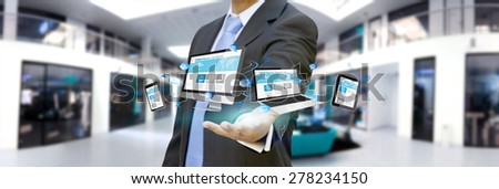Businessman using digital interface with his fingers in his office Royalty-Free Stock Photo #278234150