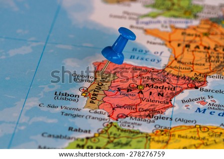 Map of Portugal  with a blue pushpin stuck Royalty-Free Stock Photo #278276759