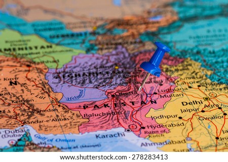 Map of Pakistan with a blue pushpin stuck Royalty-Free Stock Photo #278283413