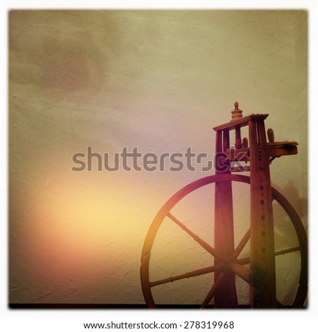 Wooden Spinning Wheel, Toned Photo, Camera Effect, Soft Focus for Background, Retro, Vintage